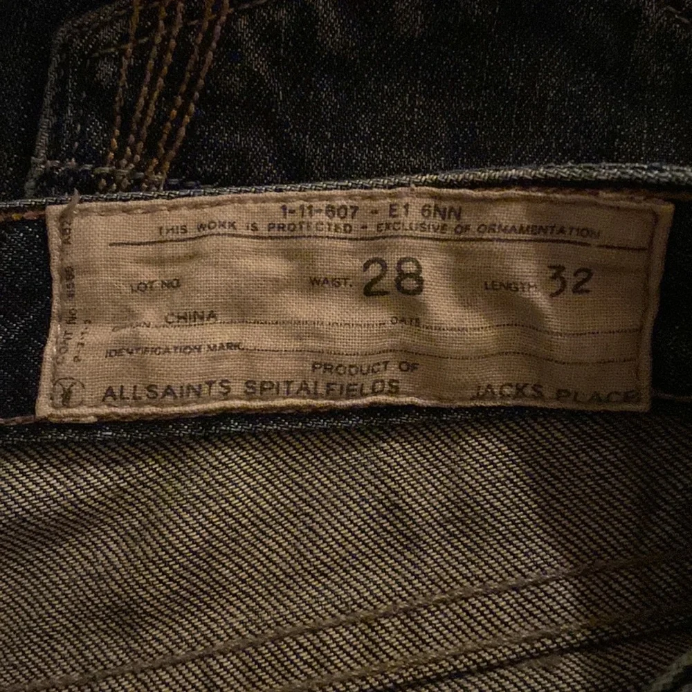 All Saints Spitalfields Jack’s Place skinny dark blue jeans from Neiman Marcus